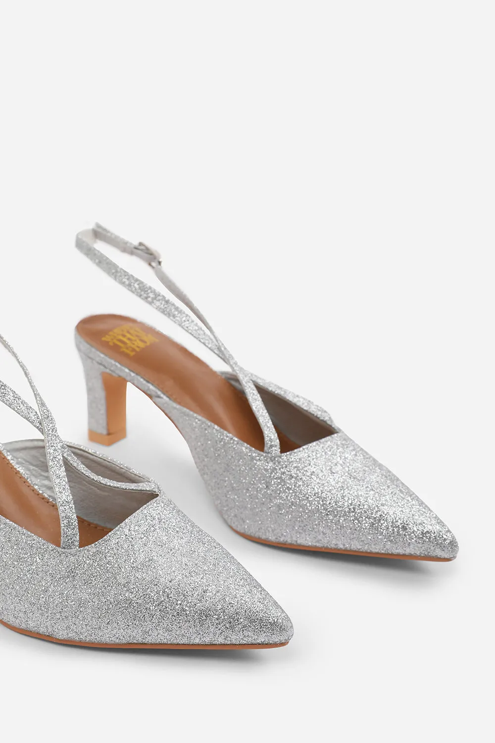 AUSTEN POINTED TOE LOW BLOCK HEEL WITH CROSS OVER ANKLE STRAP IN SILVER FINE GLITTER